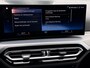 BMW 3-Serie Touring 320e | Trekhaak | Nieuw model | Carplay | Camera | Skyscraper grau | Sfeerverlichting | Widescreen | M Shadow