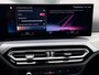 BMW 3-Serie Touring 320e | Trekhaak | Nieuw model | Carplay | Camera | Skyscraper grau | Sfeerverlichting | Widescreen | M Shadow