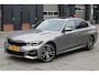BMW 3-Serie 330e M Sport Schuif kanteldak - 19 inch - Premium kleur Oxidgrau - Nederlandse Auto Dealer onderhouden - Adaptieve cruise control - 360 camera