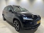 Skoda Karoq 1.5 TSI ACT Sportline Business | Navigatie/Android/Apple Carplay | LM Velgen 19" | Elektrisch Glazen Panoramadak | Voorstoelen Verwarmd | Achteruitrijcamera | Trekhaak Uitklapbaar | Cruise Control Adaptief |