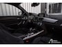 BMW 1-Serie M140i Edition Shadow Executive Maxton, schuifdak, camera, elektrische stoelen, hifi
