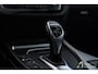 BMW 1-Serie M140i Edition Shadow Executive Maxton, schuifdak, camera, elektrische stoelen, hifi