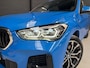 BMW X1 XDrive25e (220pk) PHEV M sport automaat - leer - schuifdak - trekhaak