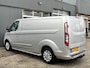 Ford Transit Custom 300 2.0 TDCI L2H1 Limited Airco Cruise control Trekhaak 2800kg trekgewicht 3-Persoons Stoelverwarming Telefoonverbinding Achterruitrij camera Parkeersensoren voor en achter Schuifdeur Euro 6