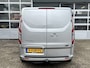 Ford Transit Custom 300 2.0 TDCI L2H1 Limited Airco Cruise control Trekhaak 2800kg trekgewicht 3-Persoons Stoelverwarming Telefoonverbinding Achterruitrij camera Parkeersensoren voor en achter Schuifdeur Euro 6
