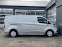 Ford Transit Custom 300 2.0 TDCI L2H1 Limited Airco Cruise control Trekhaak 2800kg trekgewicht 3-Persoons Stoelverwarming Telefoonverbinding Achterruitrij camera Parkeersensoren voor en achter Schuifdeur Euro 6