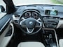 BMW X1 sDrive20i Orange Edition II | 1e eigenaar | Panoramadak | Trekhaak | HUD