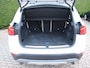 BMW X1 sDrive20i Orange Edition II | 1e eigenaar | Panoramadak | Trekhaak | HUD