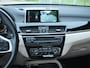 BMW X1 sDrive20i Orange Edition II | 1e eigenaar | Panoramadak | Trekhaak | HUD