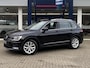 Volkswagen Tiguan 1.4 TSI ACT Comfortline Business / Cruise-Control / Climate-Control / Stoelverwarming / Apple-Carplay & Android-Auto / Trekhaak / Elektr.-Achterklep / Draadloze-Telefoonlader / Armsteun-V+A / Radio-Bluetooth / PDC V+A / 17'' LMV / ENZ.