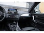 BMW 1-Serie 114i Business+ | M-Sport | NAP | Clima | Cruise | Leder | Sensoren | Xenon |