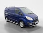 Ford Transit Custom 270 2.2 TDCI L1H1 Anniversary Edition 125 PK | 18" LM velgen | Achteruitrijcamera | Parkeersensoren | Trekhaak | Dakreling | Sidebars | Stoelverwarming | Euro V