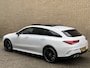 Mercedes-Benz CLA Shooting Brake 250 e AMG Line | Panoramadak | Camera | Navigatie | Apple CarPlay / Android Auto | Sportstoelen | Adaptieve cruise | Lane assist | Head up display | Sfeerverlichting | Stoelverwarming | LED | DAB | Keyless | Volledig onderhouden!