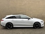 Mercedes-Benz CLA Shooting Brake 250 e AMG Line | Panoramadak | Camera | Navigatie | Apple CarPlay / Android Auto | Sportstoelen | Adaptieve cruise | Lane assist | Head up display | Sfeerverlichting | Stoelverwarming | LED | DAB | Keyless | Volledig onderhouden!