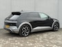 Hyundai Ioniq 5 Lounge AWD 77.4 kWh 325Pk Automaat / SOH 98% / Afn. Trekhaak / Dealer onderhouden / Fabrieksgarantie tot 11-2027 / 8 Jaar Batterij Garantie / Warmtepomp / HUD / 360 Camera / BOSE / Navigatie / Adaptieve Cruise / Elektr. Stoelen / Elektr. Achterklep / Stoel & Stuurwiel Verwarming / Stoel Ventilatie / Achterbank Verwarming /