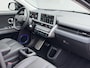 Hyundai Ioniq 5 Lounge AWD 77.4 kWh 325Pk Automaat / SOH 98% / Afn. Trekhaak / Dealer onderhouden / Fabrieksgarantie tot 11-2027 / 8 Jaar Batterij Garantie / Warmtepomp / HUD / 360 Camera / BOSE / Navigatie / Adaptieve Cruise / Elektr. Stoelen / Elektr. Achterklep / Stoel & Stuurwiel Verwarming / Stoel Ventilatie / Achterbank Verwarming /
