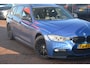 BMW 3-Serie Touring 320d High Executive M PAKKET leren bekleding sporstoelen memory schuif kantel dak Head up display stoelverwarming camera lmv Harman Kardon