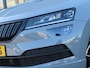 Skoda Karoq 1.5 TSI ACT Sportline Business DSG | pano dak | wegklapbare trekhaak | groot navi | voorstoelen + achterbank verwarmd | voorrruitverwarming