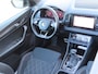 Skoda Karoq 1.5 TSI ACT Sportline Business DSG | pano dak | wegklapbare trekhaak | groot navi | voorstoelen + achterbank verwarmd | voorrruitverwarming