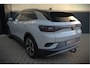Volkswagen ID.4 First 77 kWh | Stoelverwarming | Stuurverwarming | Trekhaak | Adaptive Cruise Control | Navigatie | Apple Carplay | Keyless | Camera | Parkersensoren |