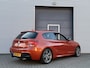 BMW 1-Serie M135i xDrive High Executive I Aut. I 320PK I Schuifdak I 67000 km