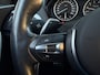 BMW 1-Serie M135i xDrive High Executive I Aut. I 320PK I Schuifdak I 67000 km