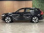 Volvo XC60 T6 AWD Recharge Ultra Dark | Head-Up Display | Harman Kardon | Adaptieve Cruise Control | Stoelverwarming voor+Achter | Stuurwielverwarming | Full LED Meesturende koplampen | Pilot Assist | BLIS Dode Hoek Detectie | Schuifdak | 20 Inch | Parkeercamera | Elektrische voorstoelen geheugen | Lederen bekleding | Zitting verlenging voorstoelen | Lederen dashboard | Google Infotainment | Keyless Drive | Parkeersensoren voor+achter | Elektrisch bedienbare achterklep | DAB Radio | Apple Carplay/Android Auto | Draadloos telefoon opladen | Volvo On Call met mobiele App functie | Onyx Black Metallic |