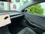 Tesla Model 3 RWD 60 KWH Premium Highland/ Afneembare trekhaak/ Warmtepomp/ LFP accu/ Stoel + stuurwiel verwarming/ Panoramadak/ Origineel NL/ NAP