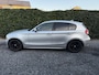 BMW 1-Serie 118i Executive | Airco | Cruise Control | Sportstoelen | Elekt. Ramen | LMV | Privacy Glass | PDC | APK tot 04-01-2027!