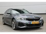 BMW 3-Serie Touring M340i xDrive First Edition Pano | Trekhaak | Camera | Comfort Access | Memory | Driving Assistent Professional | HeadUp | Laser | Frozen Grey | Dealer Onderhouden | Uniek! Concoursstaat! Nieuwprijs €109,376,00