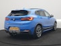 BMW X2 xDrive25e M Sport X PHEV 220pk Dealer O.H. | Trekhaak Afn. | Panodak | Adaptive Cruise | Head Up | Camera | Harman / Kardon | Lederen Competition Stoelen Memory & Verwarmd | Keyless | 19"L.M | Sfeerverlichting | Navigatie | DAB | Plug