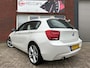 BMW 1-Serie 114i Business+ / Clima / 18 inch / PDC / Stoelverwarming