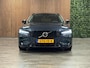 Volvo V60 T6 AWD Recharge Ultra Dark | Trekhaak | Schuifdak | Head-Up Display | Harman Kardon | Adaptieve Cruise Control | Stoelverwarming voor+achter | Stuurwielverwarming | Full LED Meesturende koplampen | Parkeercamera | Pilot Assist | BLIS Dode Hoek Detectie | Elektrische voorstoelen geheugen | Lederen bekleding | Zitting verlenging voorstoelen | Lederen dashboard | 18 Inch | Google Infotainment | Keyless Drive | Parkeersensoren voor+achter | Privacy Glass | Elektrisch bedienbare achterklep | DAB Radio | Apple Carplay/Android Auto | Volvo On Call met mobiele App functie | Denim Blue Metallic |