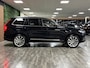 Volvo XC90 T8 AWD Recharge Bright Long Range | Trekhaak | Harman Kardon | Adaptieve Cruise Control | 455pk | Standkachel met Volvo On Call App | Stoelverwarming voor+achter | Stuurwielverwarming | 21 Inch | Full LED Meesturende koplampen | Pilot Assist | BLIS Dode Hoek Detectie | Elektrische voorstoelen geheugen | Lederen bekleding | Zitting verlenging voorstoelen | Parkeercamera | Keyless Drive | Parkeersensoren voor+achter | Privacy Glass | Elektrisch bedienbare achterklep | Geïntegreerd kinderzitje achterin | Verlichte instaplijsten | 7-Persoons | 4-Zone Climate Control | Verlichtingspack 2 | DAB Radio | Apple Carplay/Android Auto | Draadloos telefoon opladen | Onyx Black Metallic |