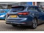 Ford Focus Wagon 1.0 EcoBoost Hybrid Titanium X | Trekhaak | Adaptief cruise control | Camera | Apple Carplay/Android Auto | Stoel/Stuur Verwarming | Dodehoek detectie | Achteruitrijcamera | Apple Carplay/Android Auto|telefoonintegratie premium | Audio installatie premium