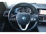 BMW 3-Serie Touring (g21) 320e 204pk I HiFi I Navi I Carplay I Stoelverwarming I LED I Cruise I Tansanitblau