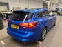 Ford Focus Wagon 1.0 EcoBoost Hybrid ST Line | Groot scherm (Sync 4) | Panoramadak | Adaptieve Cruise | Dodehoeksensoren | Stoel/stuur voorruitverwarming | Camera | All-seasonbanden | Dealeronderhouden