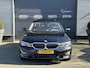 BMW 3-Serie 320i High Executive | Panoramadak | Camera | Lederen Bekleding | Stoelverwarming | Sportstoelen |