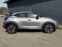 Nissan Juke 1.0 DIG-T Acenta Handgeschakeld / Allseason banden / Apple Carplay Android Auto / Achteruitrijcamera / Stoelverwarming / Navigatie / Climate control / Cruise control / Lichtmetalen wielen 17“ /