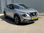Nissan Juke 1.0 DIG-T Acenta Handgeschakeld / Allseason banden / Apple Carplay Android Auto / Achteruitrijcamera / Stoelverwarming / Navigatie / Climate control / Cruise control / Lichtmetalen wielen 17“ /