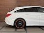 Mercedes-Benz CLA Shooting Brake 200 AMG OrangeArt Night Edition | Exclusive-pakket | PANO | Ambient | Parkeerhulp |