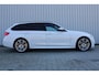 BMW 3-Serie Touring 320i M Sport Shadow Executive | Incl. 12 maanden garantie | 100% onderhouden | Head-up display | Cruise control | stoelverwarming | Navigatie | Parkeersensoren | Climate control |