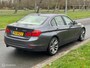 BMW 3-Serie 320i High Executive Cremeleer Navi Pdc Headup