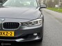 BMW 3-Serie 320i High Executive Cremeleer Navi Pdc Headup