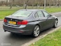 BMW 3-Serie 320i High Executive Cremeleer Navi Pdc Headup