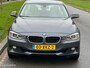 BMW 3-Serie 320i High Executive Cremeleer Navi Pdc Headup