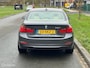 BMW 3-Serie 320i High Executive Cremeleer Navi Pdc Headup