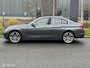 BMW 3-Serie 320i High Executive Cremeleer Navi Pdc Headup