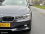 BMW 3-Serie 320i High Executive Cremeleer Navi Pdc Headup