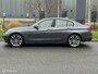BMW 3-Serie 320i High Executive Cremeleer Navi Pdc Headup